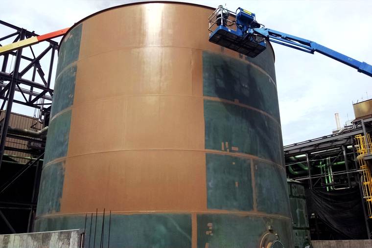 Industrial painting at a pulp & paper facility