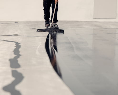 Amazing Shot Of How Epoxy Resin Is Applied. Grey Coating